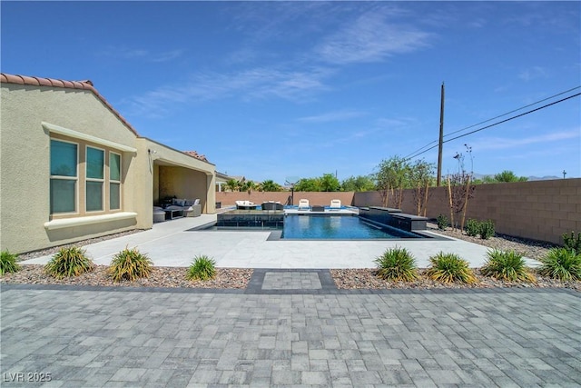 view of swimming pool featuring an outdoor hangout area, a patio, a fenced backyard, and a fenced in pool