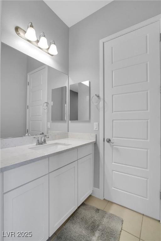 bathroom featuring vanity and tile patterned floors