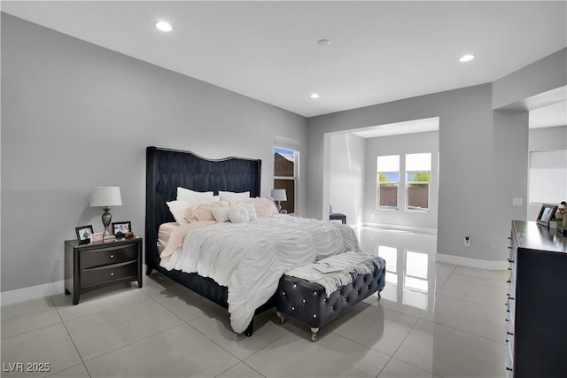 bedroom with recessed lighting, baseboards, and light tile patterned floors