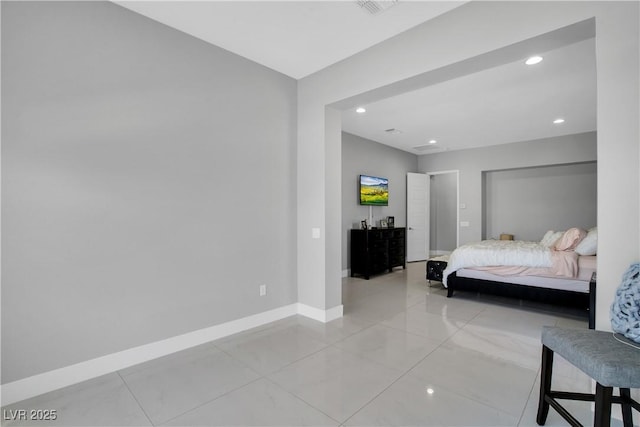 bedroom with recessed lighting, visible vents, and baseboards