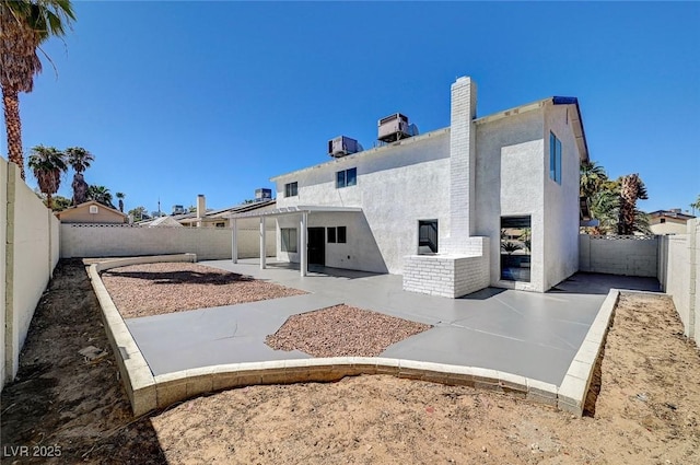 back of property featuring a patio area, a fenced backyard, and stucco siding