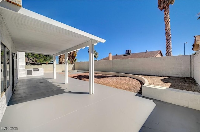 view of patio with a fenced backyard