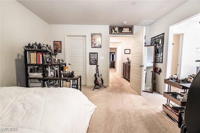 bedroom featuring baseboards and light colored carpet