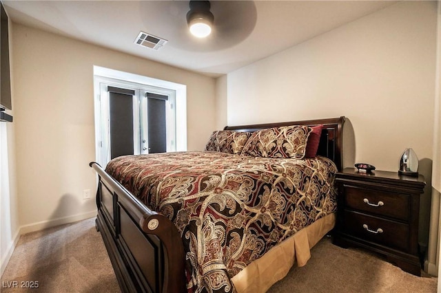 bedroom featuring french doors, visible vents, dark carpet, a ceiling fan, and baseboards