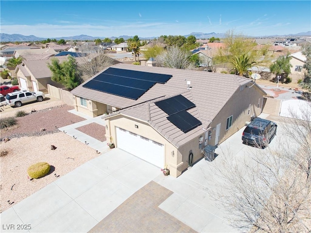 bird's eye view featuring a mountain view and a residential view