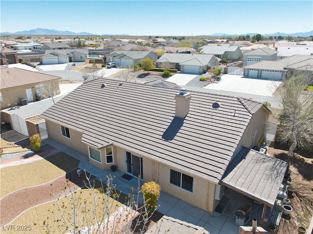 aerial view with a residential view and a mountain view