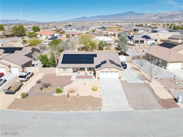 aerial view with a mountain view and a residential view