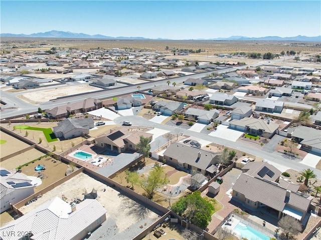 bird's eye view with a mountain view and a residential view