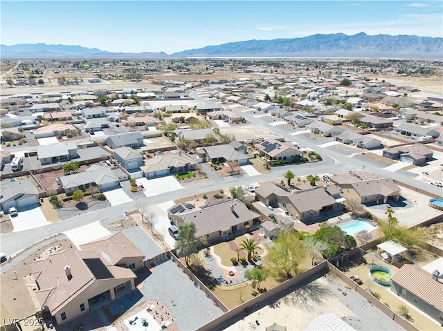 aerial view with a mountain view and a residential view