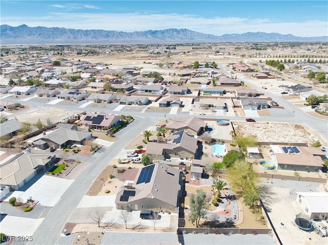 bird's eye view featuring a mountain view and a residential view