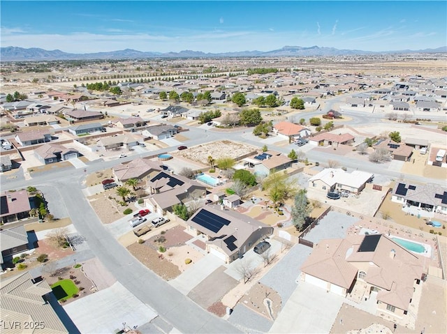 bird's eye view featuring a mountain view and a residential view