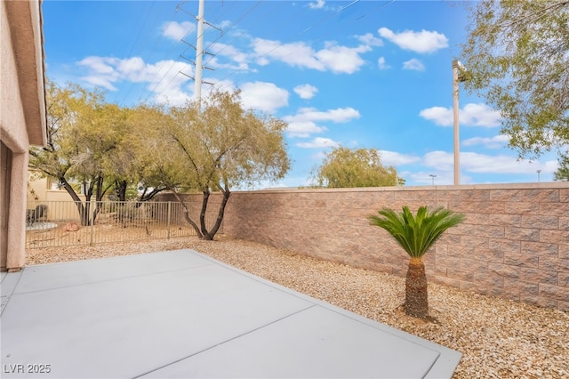 view of patio featuring a fenced backyard