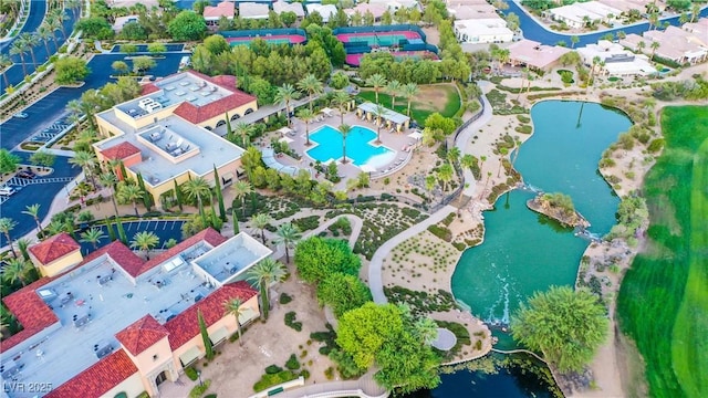 drone / aerial view featuring a water view and a residential view