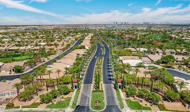 birds eye view of property with a residential view