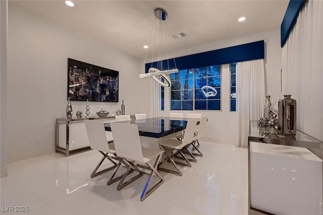 dining room featuring visible vents and recessed lighting