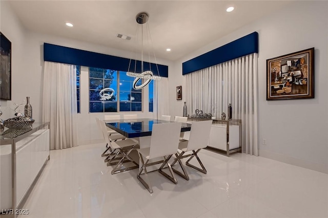 dining room featuring visible vents and recessed lighting