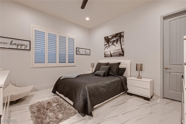 bedroom featuring marble finish floor, baseboards, and recessed lighting