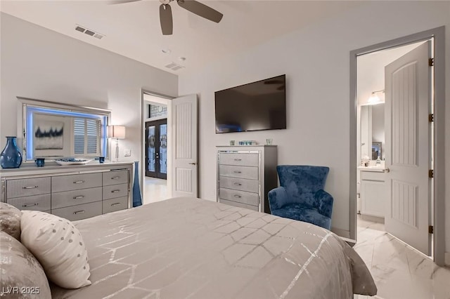 bedroom with marble finish floor, a ceiling fan, visible vents, and connected bathroom