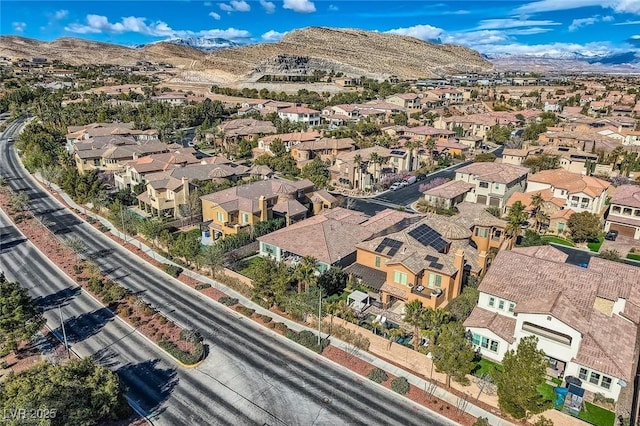 aerial view with a mountain view and a residential view