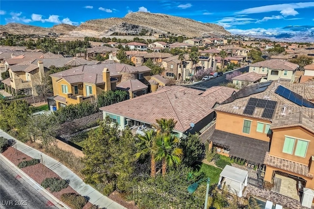 bird's eye view featuring a residential view and a mountain view