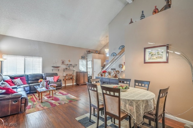 dining area featuring plenty of natural light, baseboards, and wood finished floors