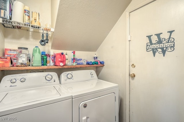 clothes washing area featuring laundry area and separate washer and dryer