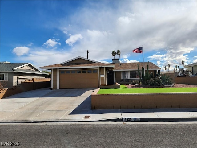 ranch-style house with a garage, a front yard, driveway, and fence