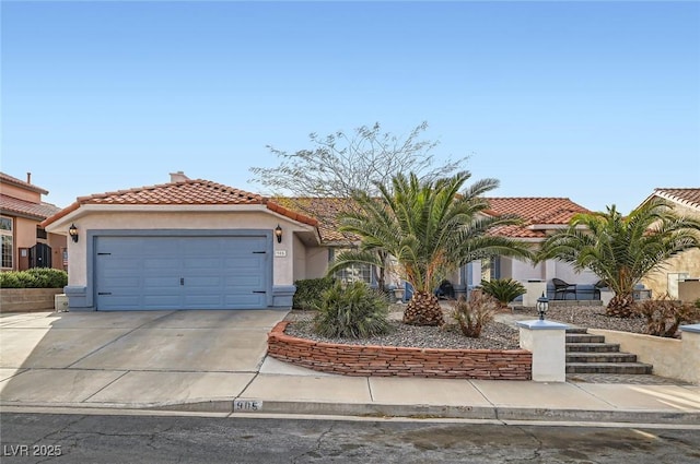 mediterranean / spanish house featuring a garage, driveway, a tiled roof, and stucco siding