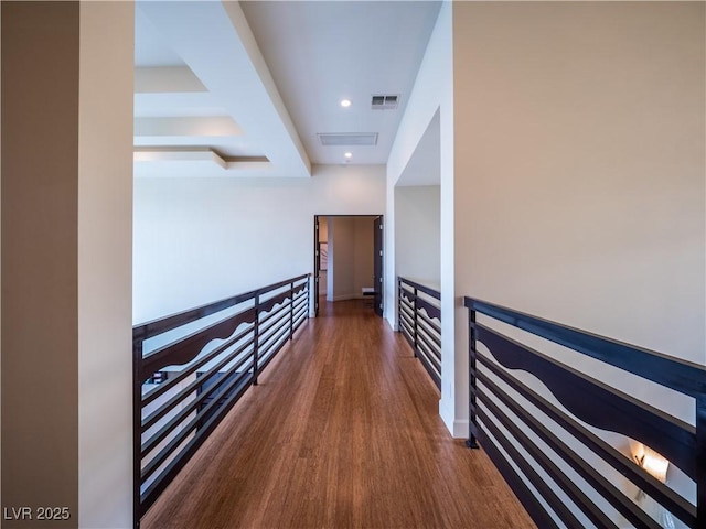 corridor featuring recessed lighting, visible vents, and wood finished floors