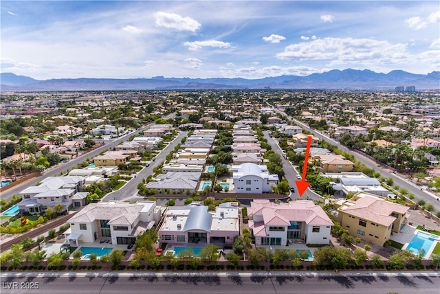 birds eye view of property featuring a residential view and a mountain view