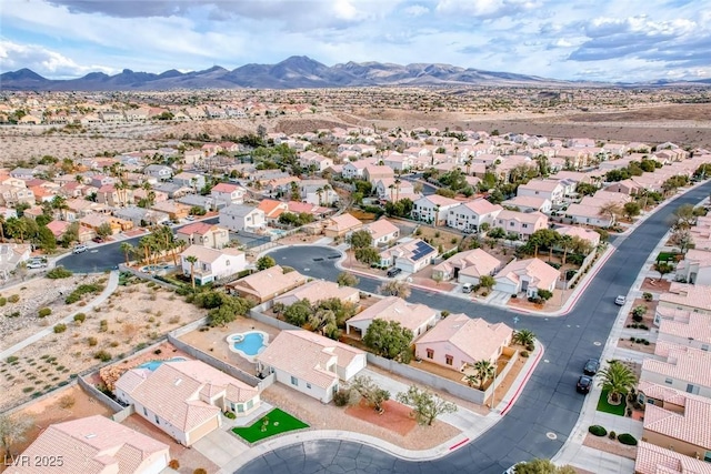 aerial view with a mountain view and a residential view