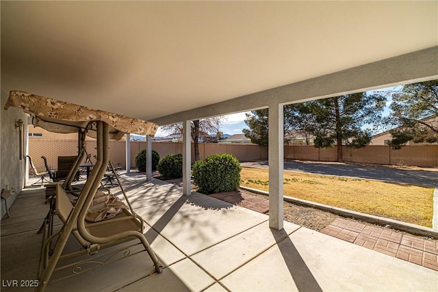 view of patio featuring a fenced backyard