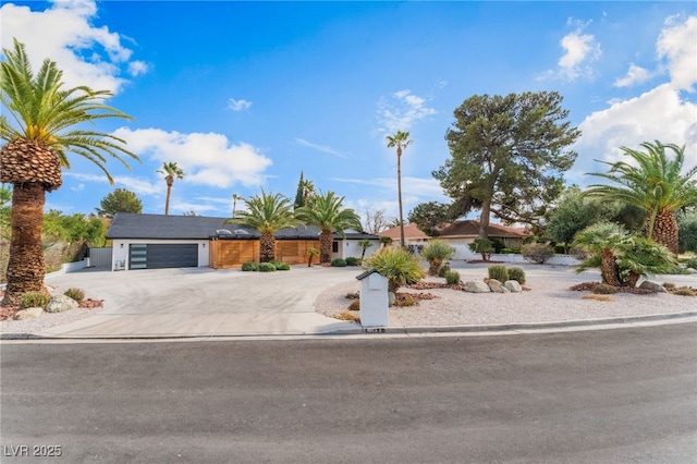 view of front of house featuring driveway and an attached garage