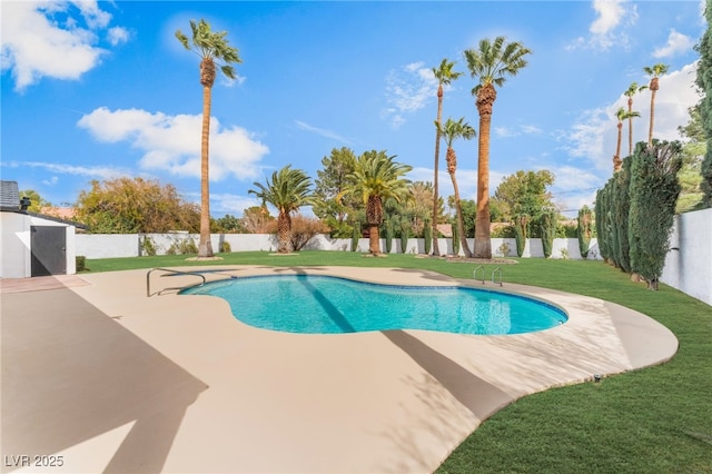 view of swimming pool featuring a patio, a lawn, a fenced backyard, and a fenced in pool