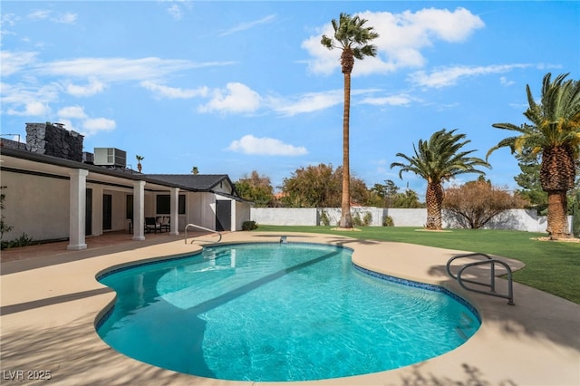 view of pool featuring a patio, a fenced backyard, cooling unit, and a fenced in pool