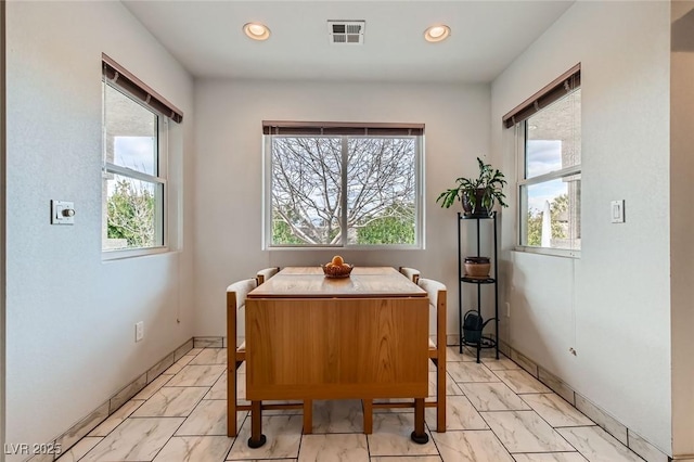 dining room featuring marble finish floor, baseboards, visible vents, and recessed lighting