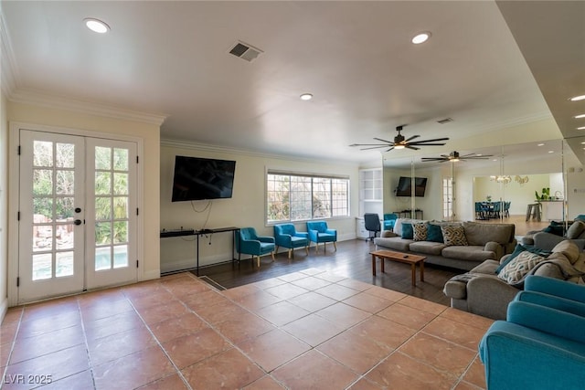 tiled living room with recessed lighting, visible vents, baseboards, french doors, and ornamental molding