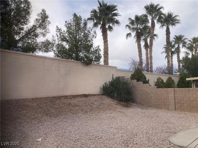 view of yard featuring fence