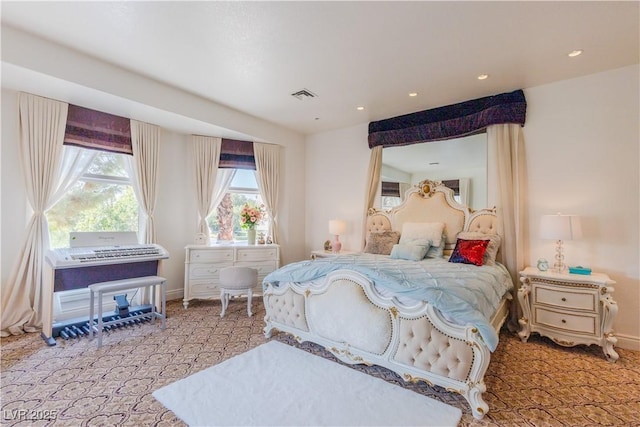 bedroom with recessed lighting, visible vents, and baseboards