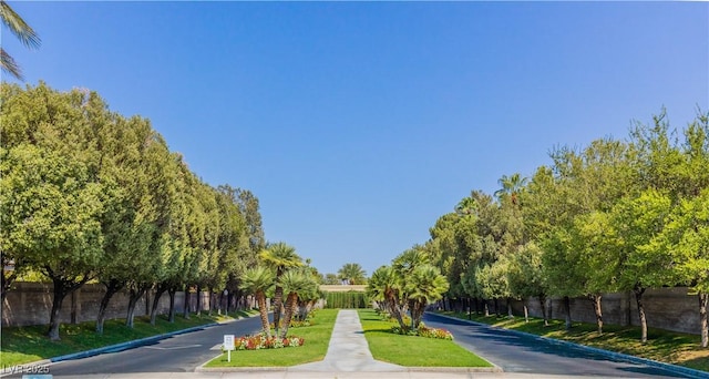 view of property's community with fence