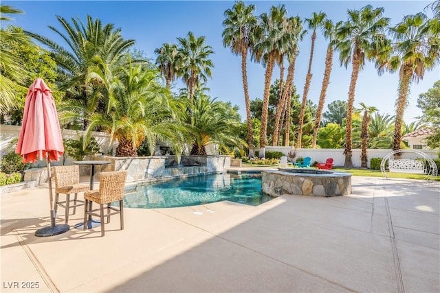 view of pool featuring a fenced in pool, an in ground hot tub, a patio, and fence