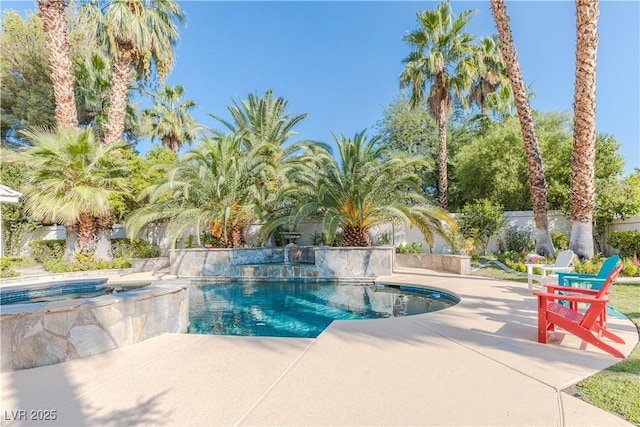 outdoor pool featuring a patio area and fence