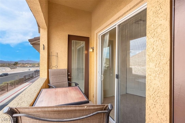 balcony featuring a sunroom