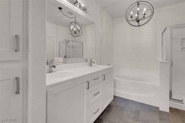 full bathroom with double vanity, a bath, a stall shower, and a sink