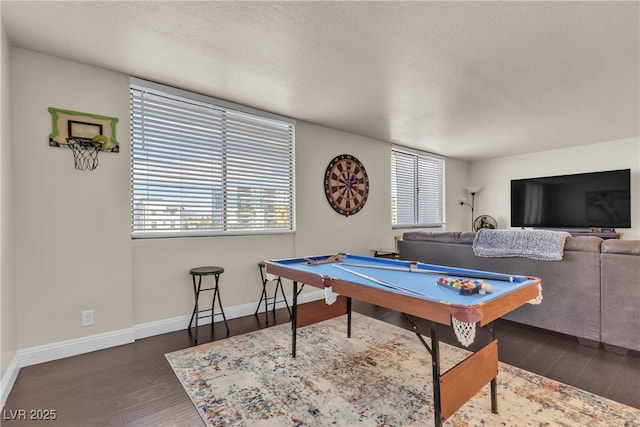 rec room with a textured ceiling, dark wood-type flooring, billiards, and baseboards