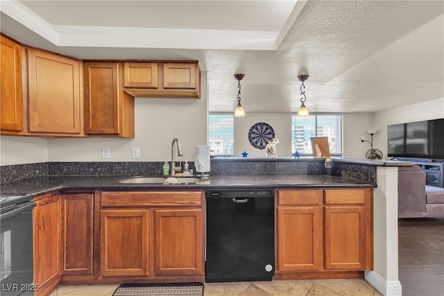 kitchen with open floor plan, a sink, dark stone countertops, range, and dishwasher