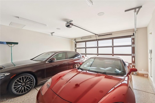 garage featuring a garage door opener