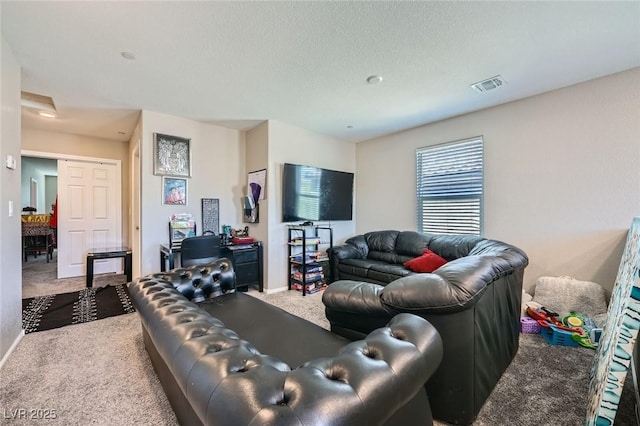 carpeted living room featuring baseboards and visible vents