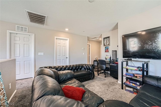 carpeted living room featuring visible vents