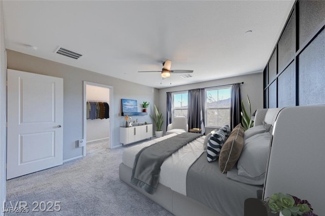 carpeted bedroom featuring visible vents, ceiling fan, and baseboards